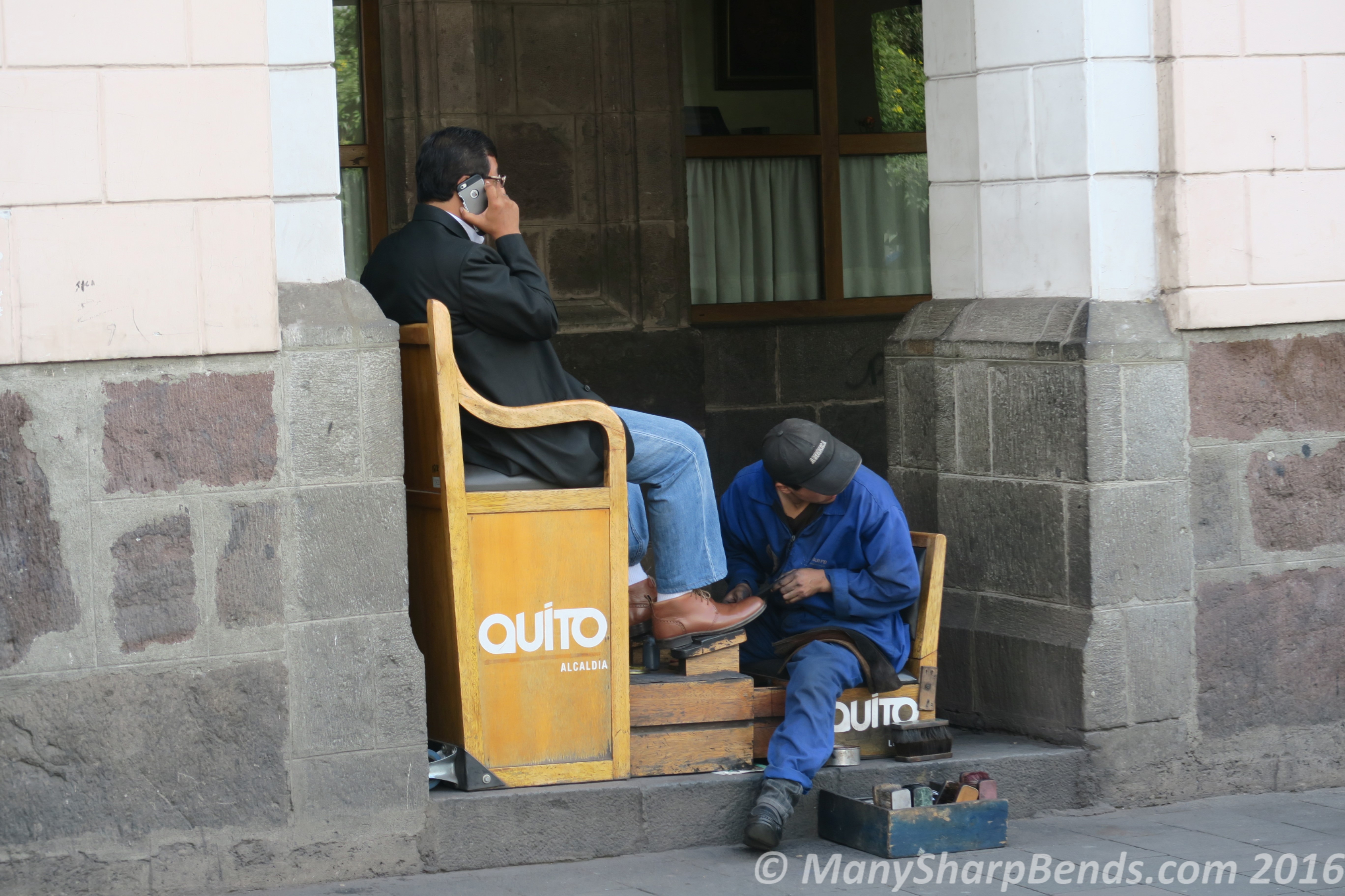 A Shoeshine Boy at the Plaza Grande